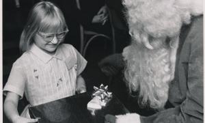 Santa hands out presents